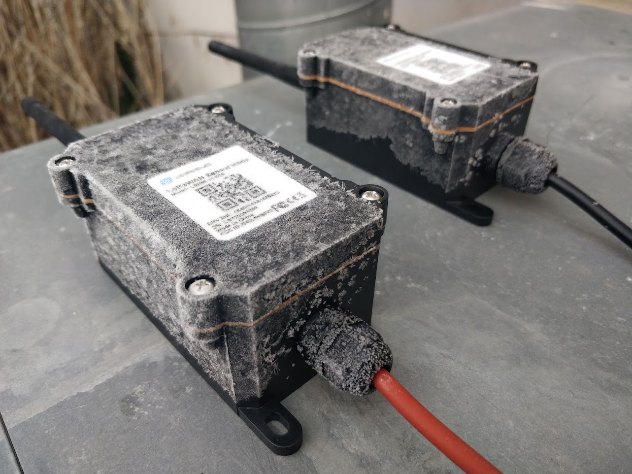 LoRaWAN sensors covered in heavy frost after a night outdoors