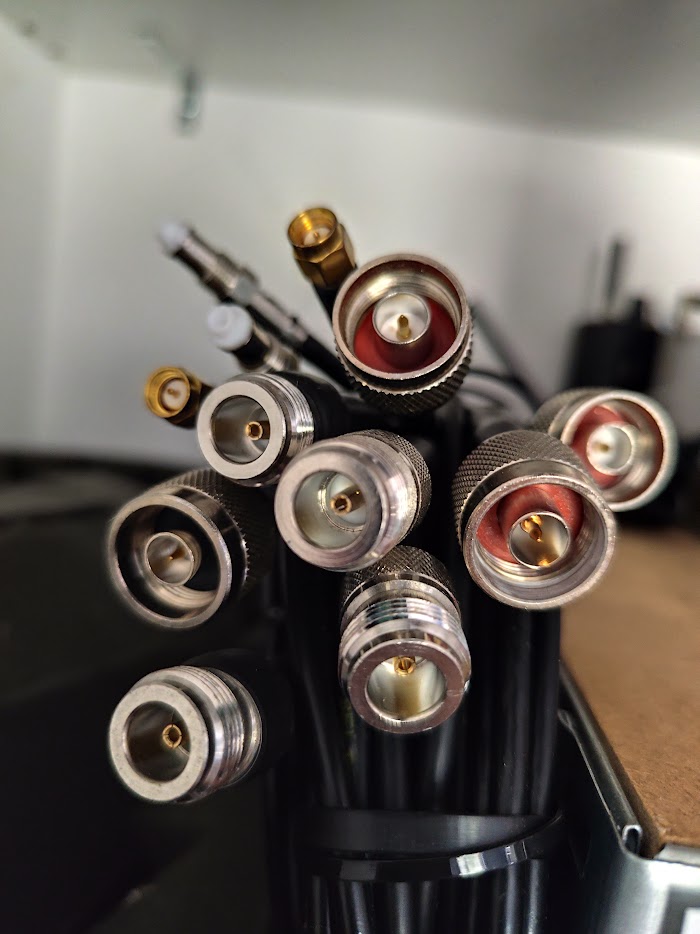 A bundle of coaxial tails terminated in N-type, the connector that survives outdoors